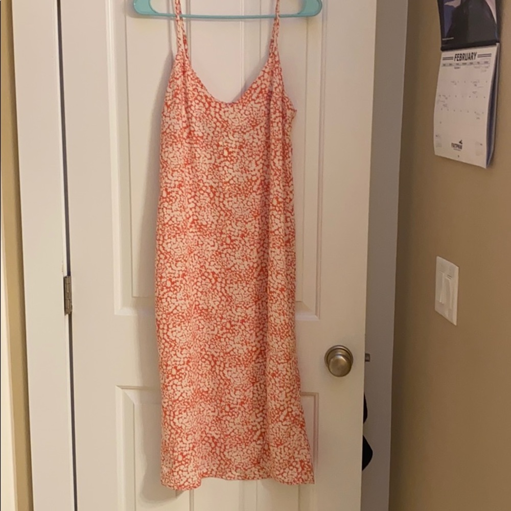 Spaghetti strap floral dress with a slit!